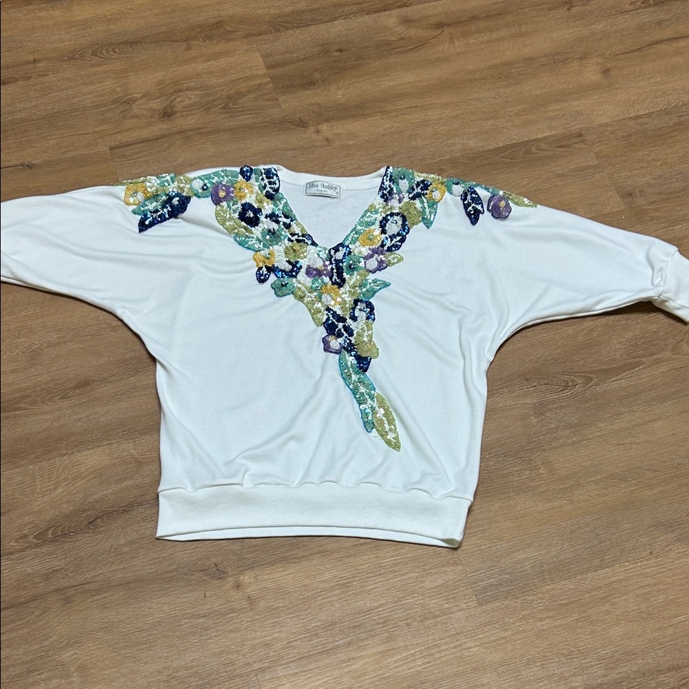 Vintage Lisa Ashley beaded top with shoulder pads.  3/4 sleeves.